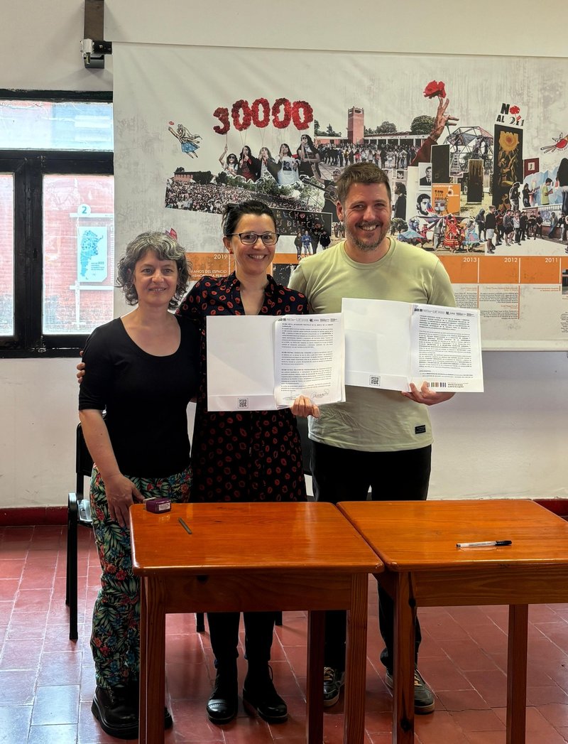 Firma del convenio con la UPC